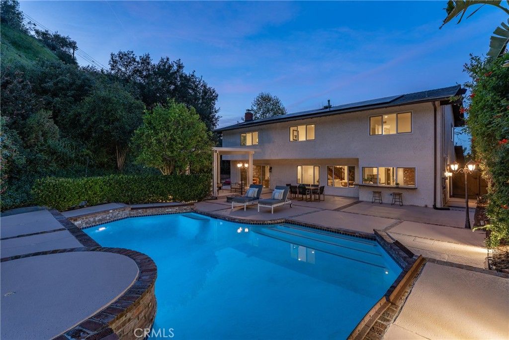 Photo of 3831 Saint Johnswood Drive, Woodland Hills, CA 91364 (MLS # SR26045080)