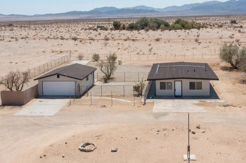 Photo of 84417 Amboy Road, 29 Palms, CA 92277 (MLS # 219140455DA)