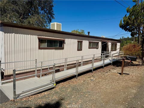 Photo of 4023 Hemlock AVE, Clearlake, CA 95422 (MLS # LC26178472)