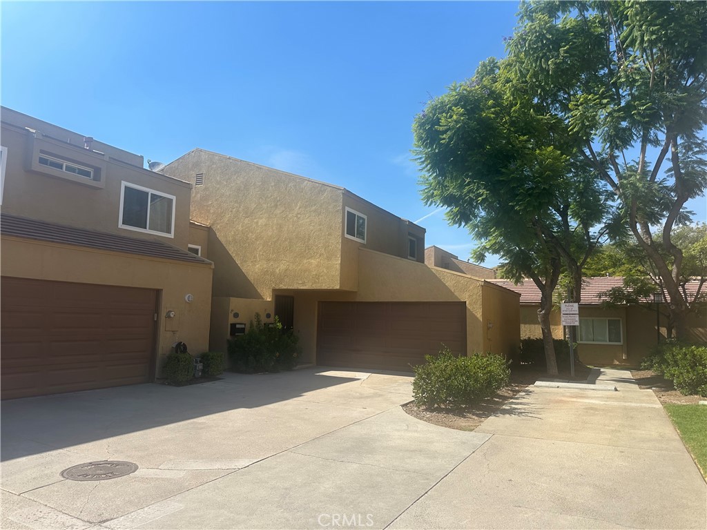 Welcome to 4781 Logana Plaza, a comfortable and functional home offering 3 bedrooms, 2.5 bathrooms, and a versatile bonus room off the primary bedroom, perfect for a home office, hobby space, exercise area, or private retreat. The spacious kitchen is thoughtfully designed with ample counter space, generous cabinetry, and comes equipped with a dishwasher, oven/stove, and microwave. A dedicated laundry room with washer and dryer included adds to the home's convenience, as well as the 2-car garage. The living room features a cozy fireplace, while the dining area opens to a private back patio that overlooks a lush greenbelt with no rear neighbors. Located in the highly sought-after Placentia-Yorba Linda School District, the home is zoned for Fairmont Elementary, Bernardo Yorba Middle, and Esperanza High School. Residents enjoy access to two community pools, spas, and expansive greenbelt areas, with nearby Fairmont Knolls Park offering tennis courts and a playground. Shopping and dining are just minutes away, with Trader Joe's, HomeGoods, and other local favorites easily accessible.