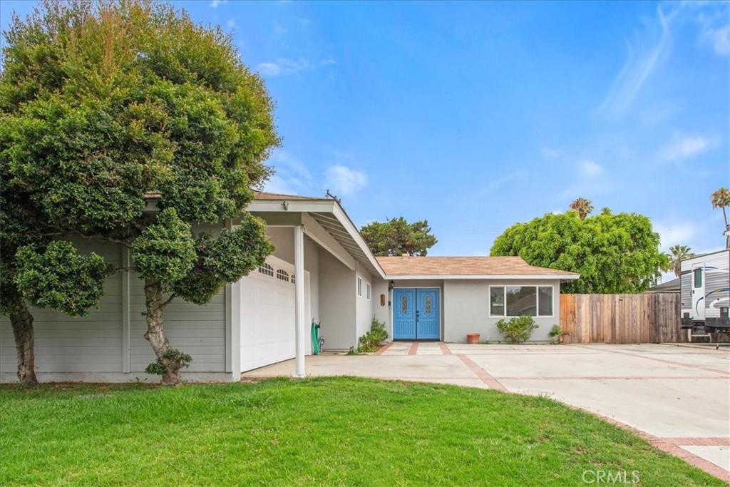 First time on the market in nearly 50 years! Welcome to 4148 Santa Lucia Street—a single-level home brimming with opportunity and ready for its next chapter. Lovingly cared for by the same owner for decades, this 3-bedroom, 2-bathroom property offers a solid foundation and fantastic opportunity for personalization. Inside, you’ll find an open kitchen and living room, both leading out to the spacious backyard perfect for relaxing or entertaining. While the kitchen and bathrooms remain mostly original, they offer excellent layout and flow—ideal for those looking to renovate and build instant equity.
The private backyard features mature landscaping including fruit trees and plenty of room to garden, play, or entertain. A custom built workshop/artist space or 'she-shed' offers so many possibilities. Other highlights include a two-car garage, ample storage, and a quiet, well-established neighborhood just minutes from schools, shopping, dining, and freeway access. This is a rare chance to own a well-loved home with great bones in a sought-after Orange location. Don’t miss it—bring your vision and make it your own!