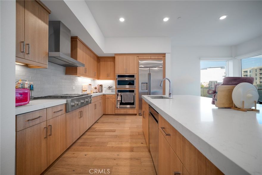 Located on the third floor, this residence at 1310 Rivington, Irvine offers 1,794 square feet of single-level living with two private bedroom suites. The elevated setting provides enhanced privacy, abundant natural light, and a clean, contemporary feel throughout.

The open-concept floor plan is designed for both everyday living and entertaining, extending to a private patio for outdoor enjoyment. Interior highlights include upgraded flooring, modern countertops, sound-reducing windows in the primary suite, and thoughtfully selected designer finishes.

Situated within the Lexington at Central Park West community, residents enjoy access to resort-style amenities including an expansive clubhouse, Junior Olympic swimming pool, outdoor spas, fitness center, half basketball court, pickleball courts, EV charging stations, dog park, cabanas, and BBQ areas.

Centrally located in the heart of Irvine, just minutes from Newport Beach, Fashion Island, and the University of California, Irvine, this home offers a rare blend of comfort, convenience, and elevated urban living.