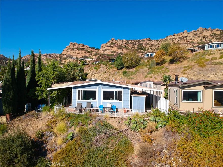 A RARE FIND! One of the best LA views and priced under 2 mil!!

Welcome to Mountain Village in Canoga Park a rare opportunity to own a beautifully remodeled 2 bed, 2 bath home with one of the best views of Los Angeles. Perched along the hillside with privacy and gated entry, this residence blends comfort with modern upgrades.



Inside, enjoy new finishes, fresh design touches, and natural light throughout. The home features laundry hookups, spacious living and dining areas. 



Community amenities include a clubhouse with pool, spa, gym, barbecues, and meeting rooms, plus full-time on-site staff and maintenance crew. With electric security gates, RV storage, and a true family-friendly atmosphere, Mountain Village is more than a home it's a lifestyle.



?? Prime location with sweeping LA views, close to shopping, dining, and freeway access. Monthly space rent includes security gates and community upkeep.