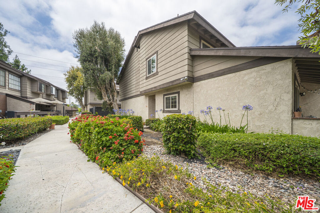 ** FHA APPROVED + SELLER PAYING FOR YOUR HOA FOR A YEAR! ** $20k Grant for first-time buyers available at CNB ** Welcome to 1507 W Lambert Road, La Habra, CA 90631, where you can call HOME! A well-maintained and thoughtfully updated 2-bedroom, 2.5-bathroom condo offering comfort, convenience, and modern style. This bright and inviting home features an open-concept layout with newer laminate flooring, fresh paint, and plenty of natural light throughout. The kitchen boasts ample cabinetry, solid surface countertops, and a dedicated dining area. Two generously sized bedrooms provide spacious closets and a comfortable retreat, while the bathroom includes tasteful upgrades and a clean, modern design. Enjoy your own private outdoor patio with the pool view, perfect for relaxing or entertaining. The attached 2-car garage provides such a convenience and security. The community offers well-kept grounds, a refreshing swimming pool, and gated entrance. Conveniently located near shopping centers, restaurants, schools, parks, and freeways, this property is ideal for first-time buyers, downsizers, or investors.