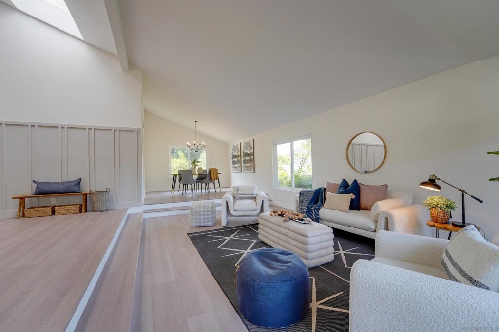 Welcome to a completely remodeled and recently revamped oasis in a serene environment with breathtaking views from every window of the house. This bright and light home has all new stainless steel appliances in the open concept kitchen, double ovens, quartz countertops, new HVAC, wet bar, laundry room, and a three car garage. Carefully curated, designer touches throughout the entire house blend comfort and luxury, while the primary suite with peaceful views has vaulted ceilings, a freestanding soaking tub, wet room, and two oversized closets. This beautiful home sits on a large, private lot with a backyard that is a tranquil retreat, complete with pergola and a fully landscaped, but low maintenance yard.