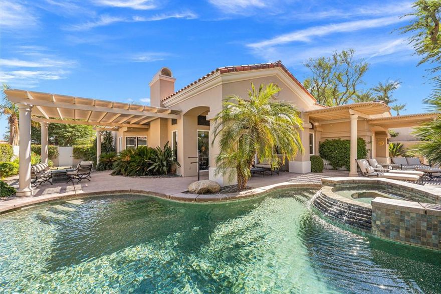 A Rare Find in Indian Ridge Country Club. Built in 2006, this stunning Ocotillo 3G is one of the newest homes in Indian Ridge and sits on a rare two-lot parcel. With 3,869 square feet of luxurious living space, the home features 4 bedrooms and 4.5 baths including a private guest casita, perfectly designed for comfort and privacy. Step inside and you'll find beautiful custom upgrades throughout, from granite slab counters and GE Monogram appliances to wool carpeting, Venetian plaster walls, and remote-controlled shades. Every detail reflects quality and sophistication, complemented by high-end furnishings included in the sale. The outdoor living space is your private resort complete with multiple seating areas, a sparkling saltwater pool and spa (accessible directly from the primary suite), and breathtaking west-facing views of the San Jacinto Mountains across the Grove's 9th fairway. The pool features a new filter pump and heater, and its interior was recently bead blasted for a fresh, like-new finish. Located within the HOA section, your monthly dues conveniently cover exterior landscaping, roof maintenance, exterior painting, fire insurance on the structure, cable, Wi-Fi, and trash service, allowing you to truly relax and enjoy the desert lifestyle. Best of all, this home includes a registered Golf Membership, eliminating the waitlist. Just a short stroll from the clubhouse, dining, fitness center, and tennis and pickleball courts, everything you need is right at your fingertips. Discover easy luxury, timeless design, and effortless living in one of Indian Ridge's most desirable locations.