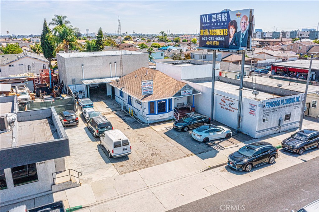 PRICE REDUCTION. HIGHT TRAFFIC ON WESTERN AVE. (Business Included) Gardena Auto Repair Shop. Included BACK Building (WAREHOUSE with 1/4 bath) 2,000 sf. Building. Used as Auto Repair Shop. FRONT HOUSE: 1,128 sf building used as a lobby office featuring 2 bedroom 1.1/4 baths. Rear building Warehouse (new roof) and used as an Auto Repair Shop and comes EQUIPPED with 4-auto lifts, 1-air compressor, 1-tire mounting and 1-tire balancer. Washer/dryer hook up. Sits on 6.490 sf. lot. Zoned GAC3.