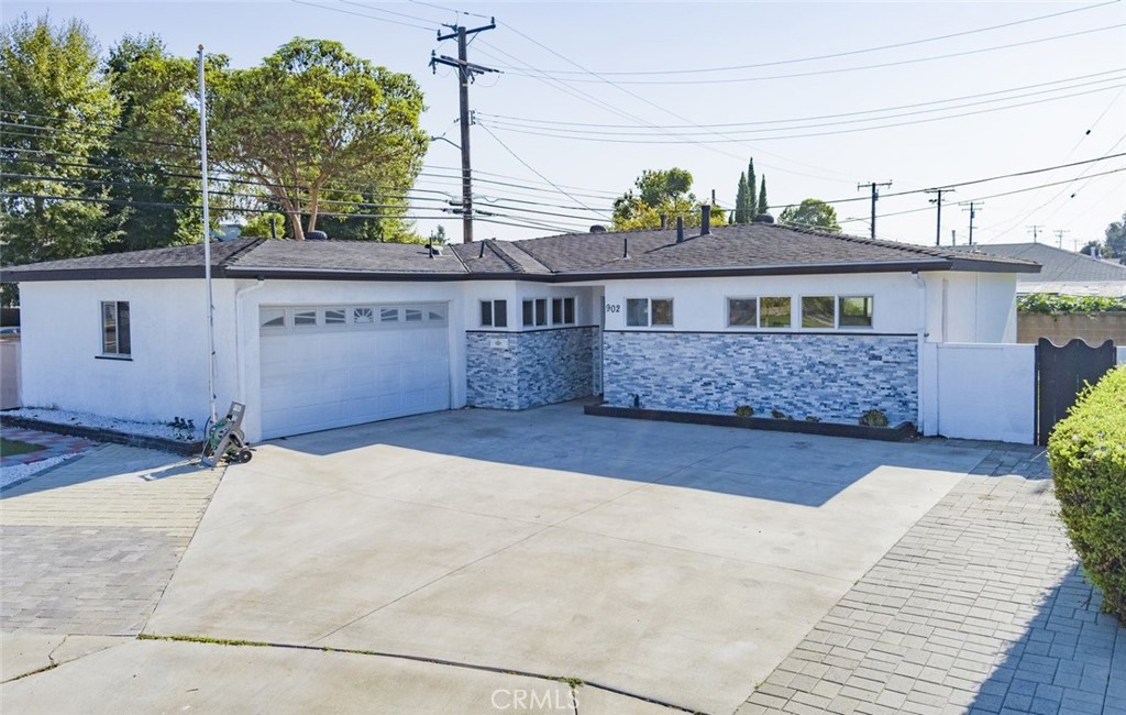 This stunning, fully remodeled cul-de-sac home on a spacious lot of blends modern comfort with unbeatable convenience. Inside, the sleek galley kitchen opens to a bright dining space, while two tastefully updated baths and three cozy bedrooms ensure daily living is both stylish and practical. Outside, there’s room for an RV or boat, plus ample paved parking and a versatile garage with laundry hookups—ideal for workshops or hobbies. Located just minutes from the expansive Mile?Square Regional Park, outdoor recreation is effortless. A short drive connects you to a trio of Vietnamese supermarkets—Song?Hy, Mom’s, and Hoa?Binh—alongside a vibrant array of nearby Vietnamese restaurants, perfect for everyday dining or weekend outings. Easy access to the 22 freeway streamlines commutes throughout Orange County. This home offers a rare combination of thoughtful renovation, lifestyle convenience, and proximity to cultural and recreational gems in one of Little Saigon’s most desirable pockets.