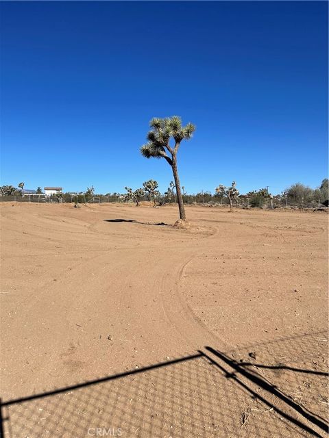 Photo of 3884 Indio Avenue, Yucca Valley, CA 92284 (MLS # JT25174119) Photo of 3884 Indio Avenue, Yucca Valley, CA 92284 (MLS # JT25174119)