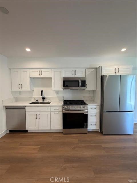 Photo of 14165 Erwin Street #A, Valley Glen, CA 91401 (MLS # SR26177593)