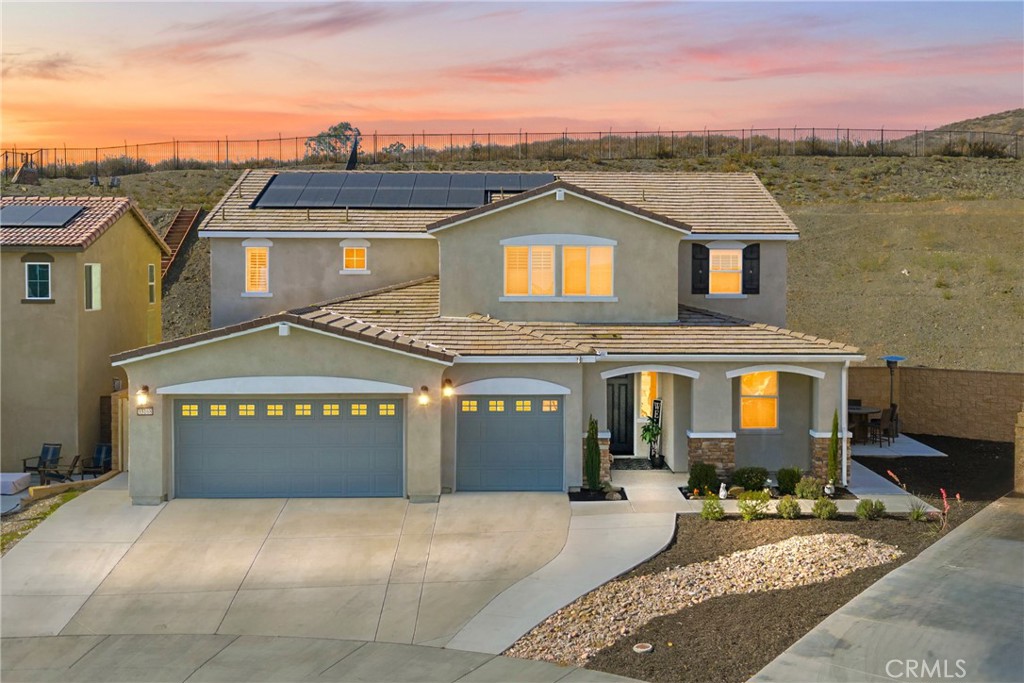 Welcome to this STUNNING EXECUTIVE LENNAR home nestled in the rapidly growing area of Winchester, situated at the end of a serene cul-de-sac. This property boasts a remarkable two-story layout featuring a spacious ADU/Next Gen suite, offering approximately 900 square feet of luxurious living space. With its own separate entrance and private yard, this suite is perfect for generating rental income or accommodating aging parents, providing them with independence and comfort. As you step inside, you'll be greeted by a fully upgraded interior that exudes sophistication and style. The main level features elegant white porcelain tile flooring that flows seamlessly throughout the open-concept design. The kitchen is truly a chef's dream, showcasing an oversized quartz island that is both humongous and inviting, making it ideal for casual dining and entertaining. The upgraded appliances will satisfy even the most discerning culinary enthusiasts, ensuring that meal preparation is a delight.
The adjacent great room and dining area create the perfect setting for hosting gatherings with family and friends. This home is designed for entertainment, with ample space for accommodating guests and making lasting memories.
Upstairs, you’ll discover four generously sized bedrooms, complemented by a spacious loft area that can serve as a playroom, media room, or additional living space. The primary bedroom is a true retreat, featuring a luxurious ensuite bathroom and a versatile suite that is perfect for a nursery, home office, or private sitting area. Each bedroom is thoughtfully designed with plenty of natural light and comfort in mind.
No upgrade has been spared in this exquisite home, ensuring that every detail meets the highest standards of modern living. Conveniently located, this property is within close proximity to reputable schools, a mere 15 minutes from the 215 freeway, and just 10 minutes from essential shopping, a new library, and an array of fantastic dining options.
Don’t miss your chance to own this exceptional home in Winchester – where luxury, convenience, and comfort meet!
---