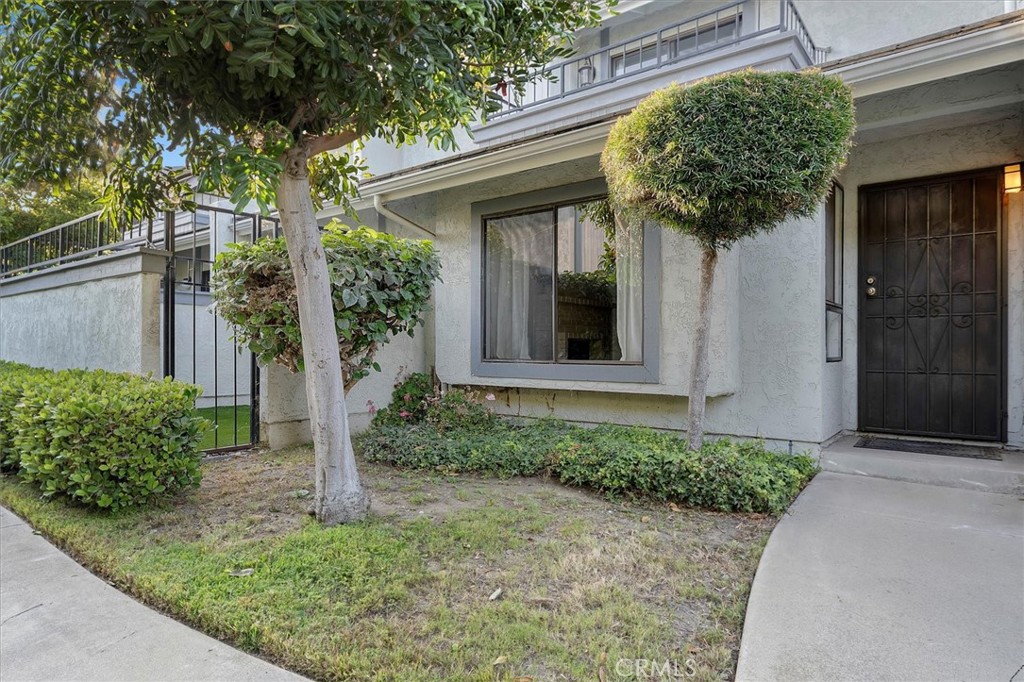 Convenient location! Quiet, peaceful spot with dozens of shops and restaurants within walking distance--plus amazing freeway access and the Torrance Unified School District! This bi-level home has great light throughout. Walk into a spacious living and dining room with fireplace, along with a separate family room that leads to private outdoor patio area. Enjoy a gorgeous kitchen with stainless steel appliances and stylish, plentiful cabinetry under recessed lighting. Primary bedroom is splashed with sunshine but also offers a private balcony and a walk-in closet featuring a designer shelving system. Attached oversized two-car garage with 220v plug. Gated community has just 15 units for ideal privacy, and the front entryway offers lovely landscaping--numerous trees and bushes in a grassy area. A larger grass play area is within the complex, and multiple parks can be reached via walk, too. But getting anywhere you want to go via the 405, 110 or 91 is a breeze from here!