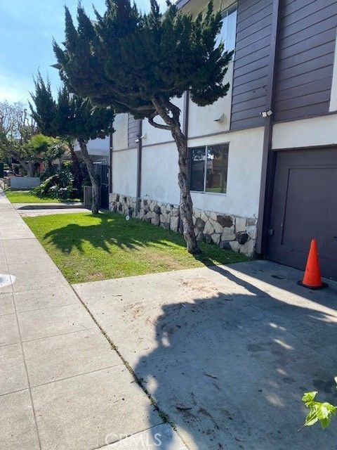 Photo of 787 Gardenia Ave, Long Beach, CA 90813 (MLS # OC26087085)