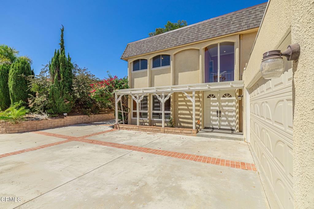 Welcome to this spectacular Sunset Hills gem showcasing breathtaking panoramic views of the rolling hills and valleys! First time on the market, this home has been meticulously maintained by the original owner! Featuring 4 spacious bedrooms including a master suite with his-and-hers closets, 3 beautifully upgraded bathrooms, and 2,236 sq. ft. of elegant living space on over a 1/2 acre lot, this home has it all. Step inside through the double door entry to find luxury vinyl plank and tile flooring throughout, a bright formal living room with a charming brick fireplace that flows into the dining area, and a cozy family room with a wet bar--perfect for entertaining. The updated kitchen boasts granite countertops, modern cabinetry, and a bay window framing the stunning scenery. With crown molding, recessed lighting, newer windows, new central AC unit 2022 and a newer roof, comfort and style meet seamlessly. Relax under the covered patio with stamped concrete while enjoying the serene, private setting at the end of a quiet cul-de-sac--just minutes from shopping, dining, and freeways, with no HOA! One minute drive to Sunset Hills Country Club which has golf, tennis, gym and an olympic sized pool. The perfect forever home!