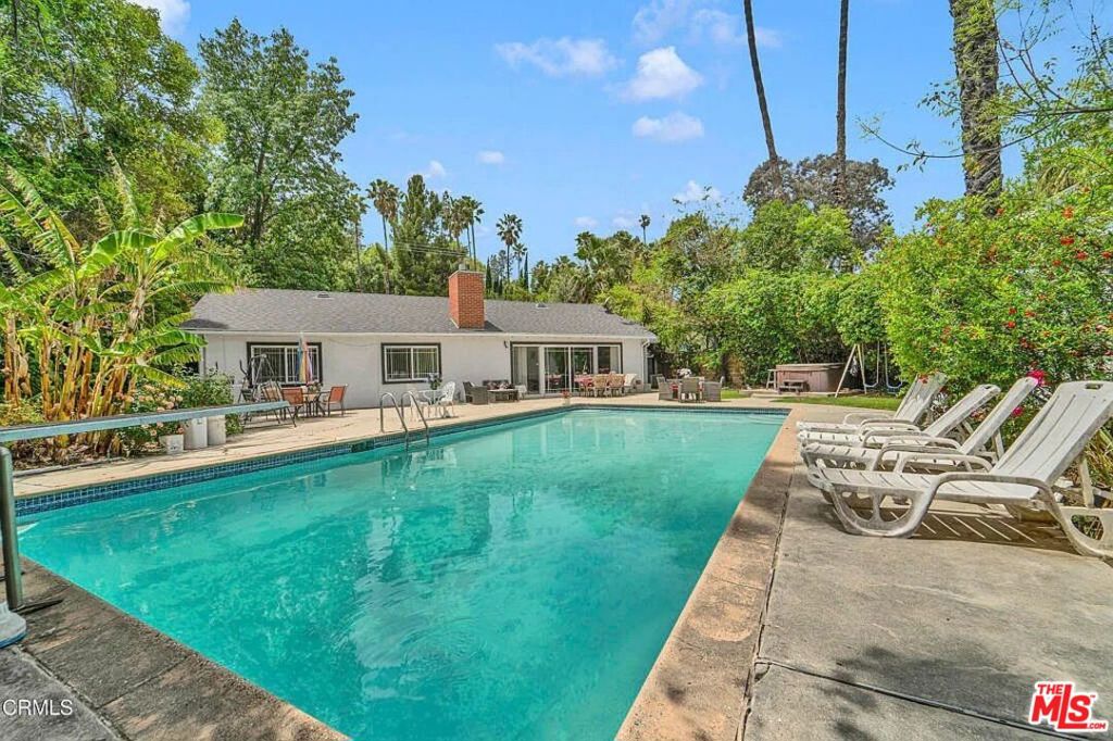 Welcome to this lovely remodeled single-story home featuring 3 bright bedrooms, and 2 luxury style bathrooms. Beautifully designed kitchen with new appliances. Breathtaking huge back yard with refreshing large in ground pool. 2 car detached garage with alley access point for entry. This home conveniently located close to El Camino high school, Calabasas, and Westfield Topanga Villag. Extraordinary opportunity to live in this dream home.