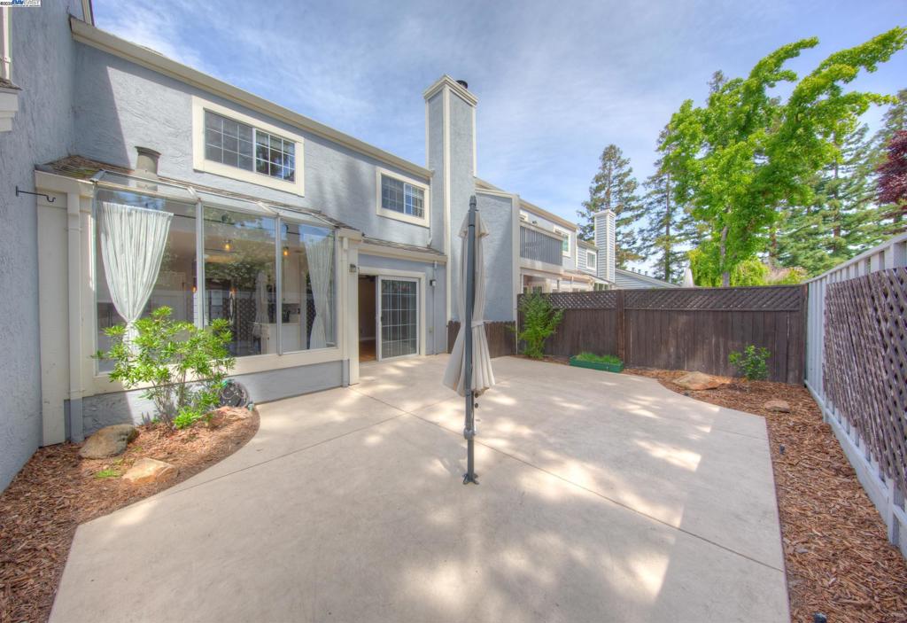 Location - Price- Location Price- This beautifully updated 3-bedroom, 2.5-bath townhome offers 1,622 sq ft of thoughtfully designed living space, seamlessly blending modern style with comfort and durability. Brand-new kitchen counter top , sink, and faucet. The outdoor area is just as impressive, featuring newly installed landscaping with Bay Area native plants like Goldenrod and Ray Hartman Ceanothus—both of which attract butterflies. The spacious private patio is perfect for both relaxing and entertaining, and the attached 2-car garage. This home is just steps from the pool and surrounded by lush landscaping and scenic walking paths. Enjoy an unbeatable location—only 5 minutes from Premium Outlets, downtown Livermore, and with quick access to both Dublin and Pleasanton. Top-rated schools are also nearby, making this home ideal for families. living room virtually staged for your convenience to showcase potential furniture arrangement.