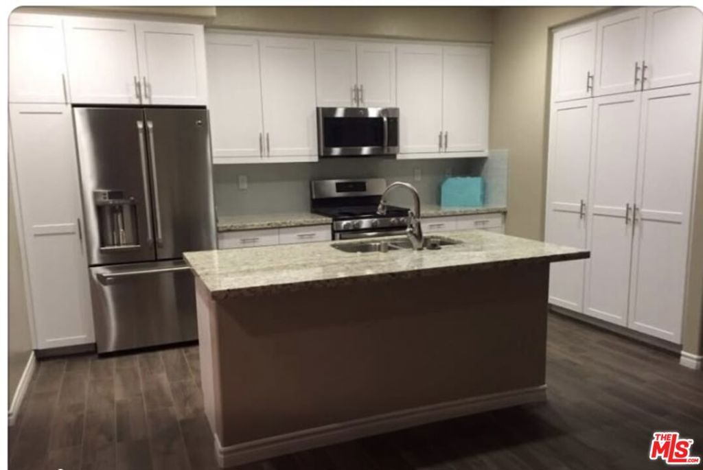 Photo of 11433 Excelsior Drive #E, Norwalk, CA 90650 (MLS # 26655085)