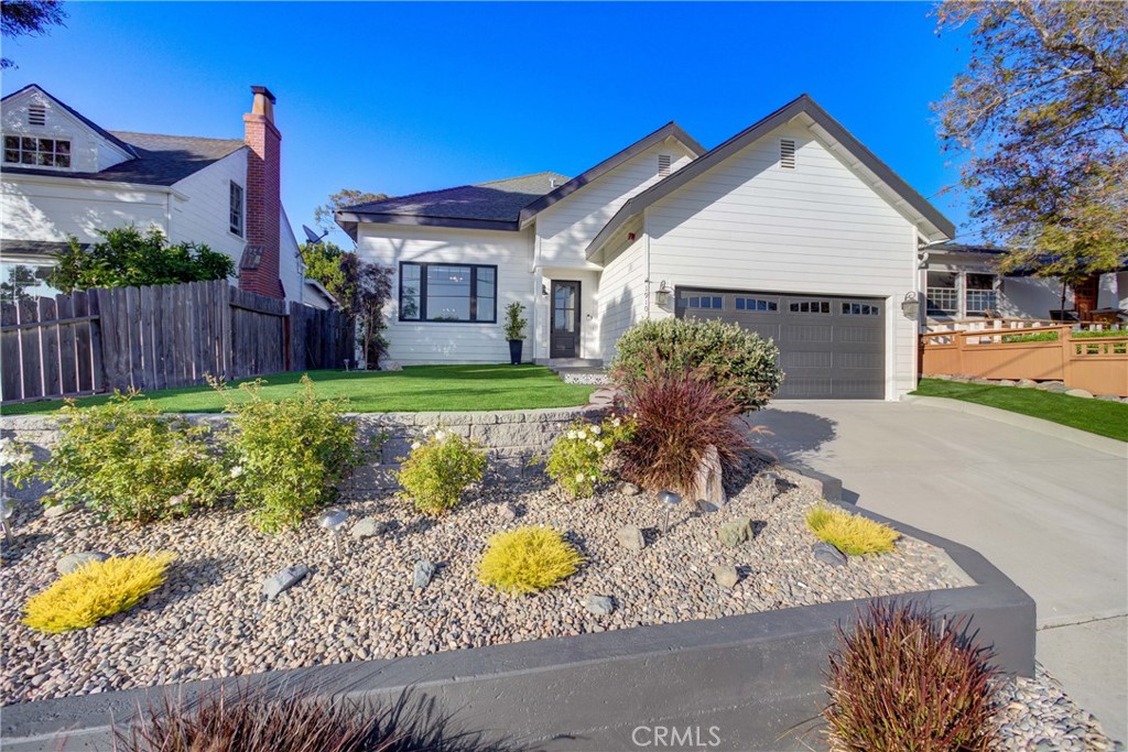 PRICE IMPROVEMENT! Welcome to this thoughtfully remodeled 3-bedroom, 2-bath home in the heart of San Luis Obispo. Renovated in 2022/23 with high-end finishes and designer details throughout, it perfectly blends modern comfort with timeless charm.
Step into a bright, airy open-concept layout featuring 12' vaulted ceilings, elegant arched doorways, and luxurious European White Oak hardwood flooring. The gourmet kitchen is a chef's dream, showcasing custom cabinetry, quartz countertops, a Viking 6-burner range and hood, Viking dishwasher, and generous prep and storage space.
The primary suite is a serene retreat with a beautifully upgraded en-suite bath. Both bathrooms feature quartz surfaces and custom finishes, creating a fresh, contemporary feel.
Enjoy your newly designed, drought-tolerant yard—ideal for entertaining, relaxing, or enjoying the mature fruit trees. The home is already plumbed and wired for a future second-story addition, allowing you to expand upward while preserving your outdoor space.
Additional highlights include Andersen windows, custom cabinetry throughout, and a two-car garage. Nestled in a quiet, well-established neighborhood close to downtown, parks, top-rated schools, hiking trails, and local hospitals, this home delivers comfort, convenience, and sophistication in one beautiful package.
Don't miss your chance to own move-in-ready gem in one of San Luis Obispo's most desirable communities!