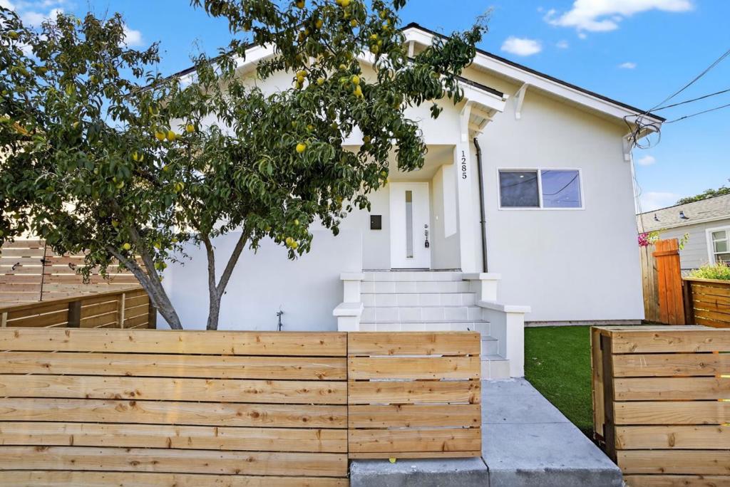 Beautifully remodeled from top to bottom, this 3 bedroom, 2 bathroom property combines high-end finishes with thoughtful design, all nestled in a centrally located San Jose neighborhood. Step inside to experience luxury living with premium flooring throughout, custom countertops, and spa-quality bathrooms. Every detail has been carefully curated to offer comfort, style, and functionality. Situated on an oversized lot, the home features a long gated driveway and a detached garage, ideal for conversion into an ADU, guest suite, or home office. With plenty of outdoor space, you'll have room for two distinct yards, perfect for entertaining, relaxing, or creating your own garden oasis. Just 7 minutes to Downtown San Jose and 5 minutes to the charming downtown strip of Willow Glen, this location offers unbeatable access to major tech campuses and commuter routes. Whether you're a first-time buyer, a savvy investor, or simply looking for the nicest home in a transitioning area, this property delivers on quality, space, and future potential. Don't miss your chance to own a turnkey home with standout style in one of San Joses most conveniently located neighborhoods.