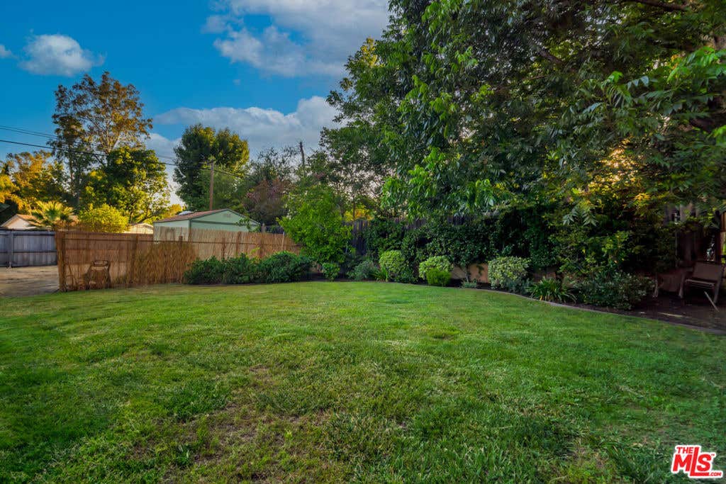 Photo of 6001 Oakdale Avenue, Woodland Hills, CA 91367 (MLS # 26674211)