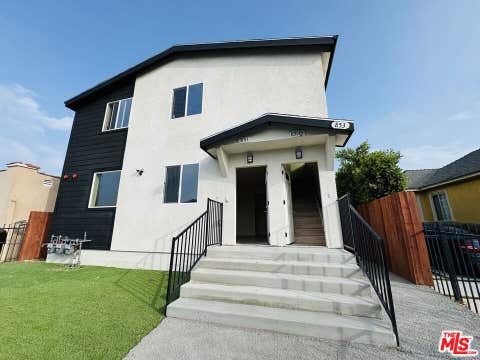 Photo of 851 1/2 E 76th Place, Los Angeles, CA 90001 (MLS # 26861287)
