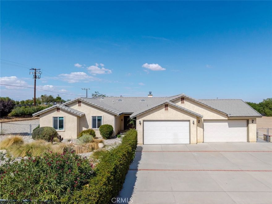 Welcome to 3715 E Avenue T2, a custom-built single-family home that has been lovingly maintained. Built in 2006, this private residence offers 4 spacious bedrooms and 3 large bathrooms, thoughtfully designed for comfort and functionality.



The inviting living room features a cozy fireplace, while the kitchen boasts abundant cabinetry with pull-out storage and a convenient lazy Susan, perfect for everyday living and entertaining. A rare 4-car attached garage provides ample space for vehicles, storage, and hobbies. The expansive lot offers tons of room for RVs, boats, and more, with plenty of space to build an ADU if desired.



Enjoy the privacy this property provides, paired with practical features and quality craftsmanship. Don't miss this unique opportunity to own a one-of-a-kind home that blends space, convenience, and long-term potential.