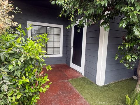 Photo of 8192 Sandcove Cir Cir #106, Huntington Beach, CA 92646 (MLS # PW26069269)