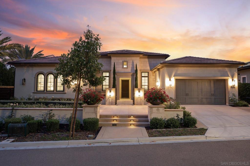 Step into refined elegance in the prestigious gated community of Palomar at Pacific Highlands Ranch. This exceptional single-story Toll Brothers estate is positioned on a premium lot with sweeping canyon views, the perfect blend of privacy and modern design. Boasting 4 spacious bedrooms plus an optional fifth bedroom or office, this flexible layout adapts to your lifestyle. An attached ADU offers ultimate flexibility for multigenerational living, a private guest retreat, or a high-end office. Soaring ceilings and expansive pocket doors create a seamless indoor-outdoor flow, welcoming natural light and framing the lush landscape beyond, an entertainer’s dream and a peaceful retreat all in one. The backyard is a private sanctuary, thoughtfully designed with mature fruit trees, manicured greenery, and serene sitting areas that invite relaxation at every turn. The designer chef’s kitchen is the heart of the home, featuring Sub-Zero, Thermador, and Wolf appliances, a spacious island, and bespoke cabinetry. Integrated surround sound enhances the ambiance throughout, whether hosting guests or enjoying a quiet evening in. The primary suite is a true haven, generously appointed with a lounging area. The ensuite bath rivals any five-star spa, with a soaking tub, a massive marble walk-in shower, and refined finishes throughout. Additional features include a three-car garage, a whole-house water filtration and softening system, and fully equipped smart tech throughout with security system for peace of mind. Residents of Palomar enjoy exclusive access to sparkling pool and spa, a state-of-the-art fitness center, a children's playground, a barbecue area, and beautifully designed gathering spaces. Ideally located just minutes from upscale shopping, fine dining, scenic coastal trails, and San Diego’s best beaches, this residence offers a lifestyle of luxury, privacy, and convenience within the award-winning Solana Beach and San Dieguito Union School Districts. This is the one you have been waiting for!