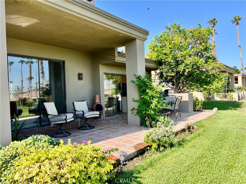Rarely available location on one of the most desirable streets in Palm Valley Country Club. This end unit, situated on an elevated lot along the 9th fairway of the Championship Course, offers approximately 1,918 sq ft with 3 bedrooms and 3 bathrooms. The 3rd bedroom is currently used as a den/office with custom built-ins. The primary suite offers a private outdoor space, while the back patio showcases sweeping views of the lake, golf course, and surrounding mountains. The property is an ideal opportunity to remodel and create your own desert retreat. Palm Valley Country Club residents enjoy access to a clubhouse, fitness center, spa, dining, tennis and pickleball courts, 40 pools, a junior Olympic lap pool, and two championship golf courses.