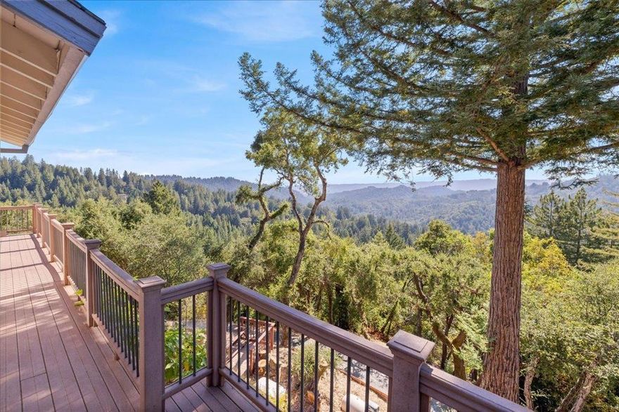 Welcome to your new home in the Redwoods!   Enjoy mountain living just 10 minutes from Highway 17.  This home offers a rare opportunity for a family, with privacy, sweeping views from every room, ample outdoor space, 2 fireplaces, and a large Western facing deck on which to relax and enjoy the spectacular sunsets. Stargaze from the hot tub located right outside the Master Bedroom.    With four large bedrooms and 2.5 baths, the home has a newer HVAC system (installed in 2020), a whole house Generac automatic generator (installed 2021), Sunny Boy Solar Panels, and an Electric Vehicle Charger.  It is freshly painted with all new interior doors. Bamboo, wood and tile flooring, along with brand new carpet.  A separate office with a Murphy bed is great for guests and could easily be converted to an ADU. Three outdoor sheds for plenty of storage and space for projects.  Large, sunny terraced hillside for planting, and an enclosed area perfect for chickens or a kitchen garden.   Excellent schools: Loma Prieta, CT English, and Los Gatos High School.
