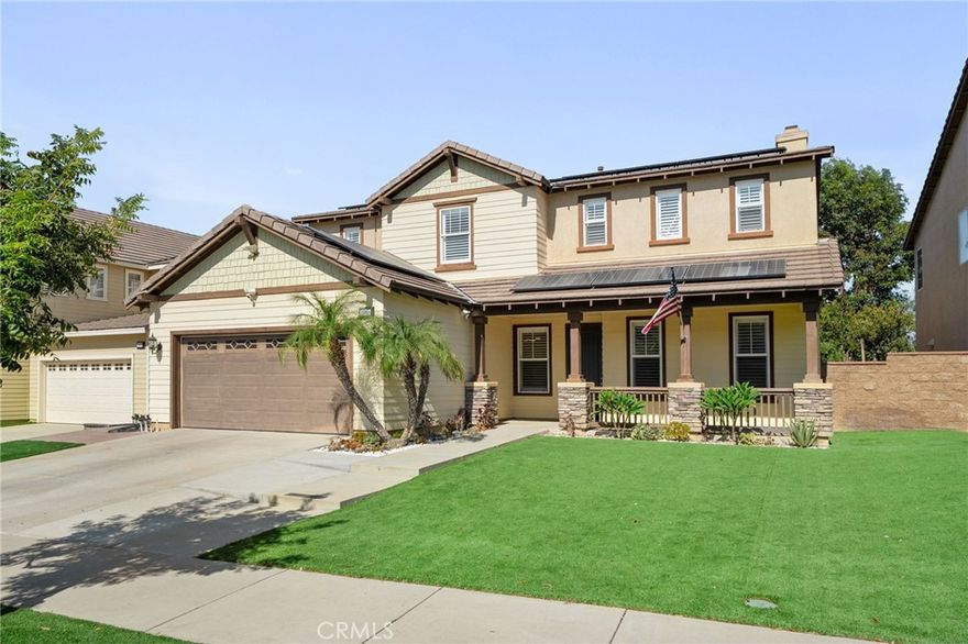 This stunning Sycamore Creek home offers incredible curb appeal with low-maintenance artificial turf in both the front and back yards and a spacious front porch perfect for relaxing evenings. The home also features fully paid-off solar panels, offering energy efficiency and long-term savings. Inside, a tiled entry leads to a formal dining room and formal living room, highlighted by crown molding and fresh interior paint throughout. The open-railing staircase and butler’s pantry add an elegant touch, while the walk-in pantry provides ample storage.



The extra-spacious family room features a cozy fireplace, media niche, and sliding doors that open to the backyard. The kitchen is truly a showstopper, showcasing stylish cabinet hardware, a marble backsplash, built-in cooktop, double ovens, a large island with breakfast nook, and plenty of counter space for cooking and entertaining.



A downstairs bedroom and full bathroom offer convenience for guests, with the bath featuring quartz counters, matching cabinet hardware, a smart toilet, and a beautifully tiled shower. Upstairs, you’ll find a generous loft and a huge primary suite with double-door entry, barn door, dual vanities, designer lighting, soaking tub, tiled walk-in shower, smart toilet and dual-entry walk-in closet. Three additional spacious bedrooms share another remodeled bathroom with dual sinks, smart toilet and a tiled shower. The upstairs laundry room includes cabinetry and a utility sink for added convenience.



The home is also equipped with a QuietCool whole house fan, perfect for efficiently cooling the home and reducing A/C usage.



The backyard is perfect for entertaining, complete with string lights, stamped concrete, a built-in BBQ, fire pit, and artificial turf for year-round greenery. The 3-car tandem garage offers plenty of space for vehicles or storage.



Enjoy all that the Sycamore Creek community has to offer—two parks, splash pad, baseball fields, dog park, skate park, walking and biking trails, clubhouse, pool, and spa—all within a highly rated school district and conveniently close to shopping and the 15 freeway.