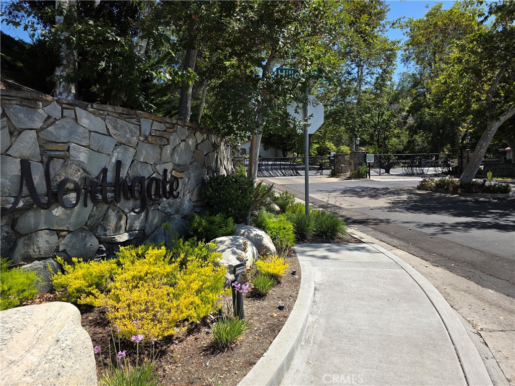 Rare rental opportunity in the exclusive Northgate community of Westlake Village! Enjoy the versatility of two expansive living spaces connected to private outdoor space and dual ensuite bedrooms, each with the feel of a private primary suite. Step outside to enjoy two serene patios: a peaceful front courtyard and a private rear patio, perfect for al fresco dining, entertaining, or simply relaxing under the mature trees. This beautifully maintained 2-bedroom, 2-bath townhouse offers 1,423 sq. ft. of thoughtfully designed living space, all on one level. Fresh white paint and brand-new designer carpet throughout give the home a clean, modern look. This home also offers a large driveway and attached garage, offering rare convenience and extra parking. Located in a gated community surrounded by lush landscaping, with amenities including a pool and spa. Just minutes from upscale shopping, dining, parks, and top-rated schools. Rentals in Northgate are extremely rare—don’t miss your chance to live in one of Westlake Village’s most desirable neighborhoods!