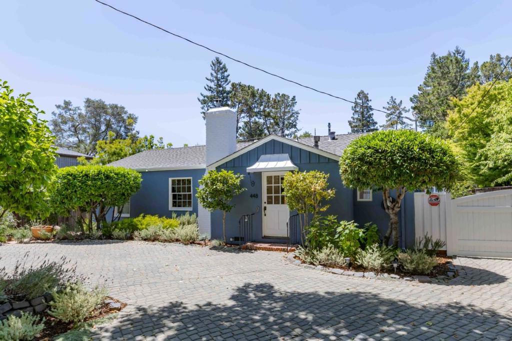 On a peaceful, tree-lined street near the Atherton border, this cottage-style home offers a great blend of charm and functionality. Hardwood floors and natural light run throughout, giving the home a warm, welcoming feel. The large living room centers around a cozy fireplace, and the eat-in kitchen features quality appliances from brands like Monogram. A separate family room opens directly to the backyard, where youll find a covered patio, lawn, and a detached guest home with its own full bathroom, perfect for visitors or a home office. Three comfortable bedrooms provide plenty of space, and the location is tough to beat: walk to Holbrook-Palmer Park and top-ranked Encinal Elementary, with downtown Menlo Park and key commute routes just a short drive away.