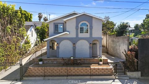 Photo of 422 Parkman Ave, Los Angeles, CA 90026 (MLS # SB26058411)