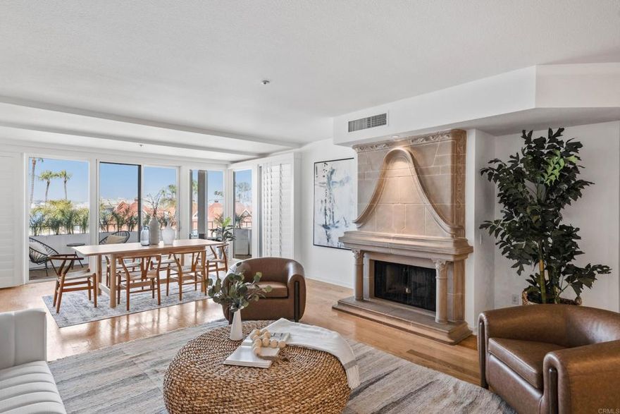 Welcome to your dream Bayfront coastal retreat in one of the most coveted locations in Coronado - The Point at Coronado Village! This expansive 3rd-floor condo at The Point offers unmatched panoramic views of the San Diego Bay, Downtown skyline, Coronado Bridge, and Ferry Landing —all from the comfort of your home. The Point offers one of the most accessible communities on the Island, within one of Coronado's most secure and well managed associations.  Spanning 2,368 sq. ft. of single-level living, this 3-bedroom, 3 bath home features a spacious, open floor plan designed to maximize natural light and take full advantage of the surrounding scenery. The beautifully updated interior includes hardwood floors, new paint throughout, new carpet in the primary bedroom and more.  The chef’s kitchen offers high-end appliances including a ‘Viking’ range, granite countertops, custom cabinets and wet bar. Floor-to-ceiling sliding glass doors extend the living space onto a private wraparound balcony—perfect for entertaining or simply soaking in the views. The luxurious primary suite features direct balcony access, a spa-like en-suite bath with an adaptive soaking tub, dual vanities, and generous walk-in closet. Two additional large bedrooms, two full bathrooms and laundry room complete the remaining interior. Community amenities include two secure, underground parking spaces, private storage unit, Bayfront pool & spa, fitness center with sauna, and clubhouse.   Enjoy the best of Coronado living with easy walkable access to the vibrant Coronado Ferry Landing with an abundance of shops, restaurants, and cafes. Adjacent to Centennial Park and the shops, restaurants and groceries along Orange Avenue.  Opportunities like this rarely come along!