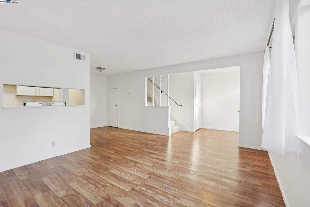 Fantastic opportunity for investors or first-time buyers! This updated and sun-filled Townhouse-style Condo offers 2 bedrooms, 1 bath, and 873 sq. ft. of comfortable living in the desirable Del Rio area. Enjoy an open floor plan with a spacious living and dining area, a beautifully updated kitchen with new appliances, and a refreshed bathroom. Fresh interior paint throughout makes this home truly move-in ready. Garage parking is included, plus community amenities such as a playground, pool, and BBQ area. Conveniently located with quick freeway access, close to BART, shops, Costco, restaurants, downtown, and the theatre. Why rent when you can own?