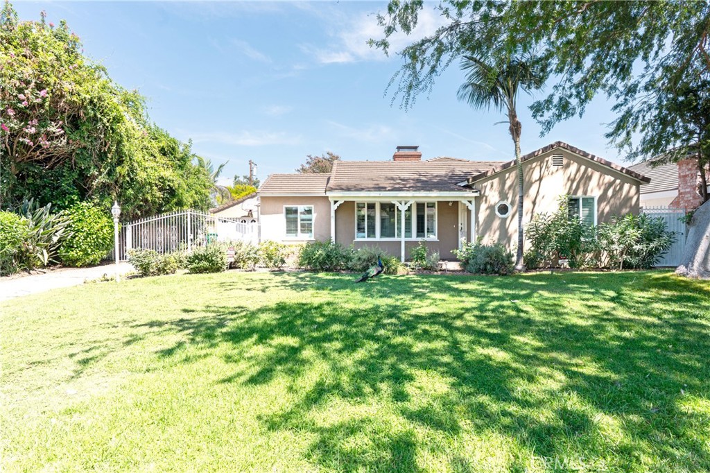 Welcome to this beautifully maintained 3-bedroom, 2.75 bathroom single-story home nestled in the highly desirable area of Arcadia. Set on a spacious 10,500 sq.ft. lot, this 2,042 sq.ft. residence offers timeless curb appeal, mature landscaping. The inviting front porch, shaded by graceful trees, leads into a bright and well-designed interior featuring a spacious living room, formal dining area, and a functional kitchen ready for your personal touch. With three generously sized bedrooms and three full bathrooms, this home is ideal for both comfortable everyday living and entertaining. The low maintenance backyard is perfect for outdoor activity and relaxation . Walking distance to Arcadia mall and Arboretum & Botanic garden .