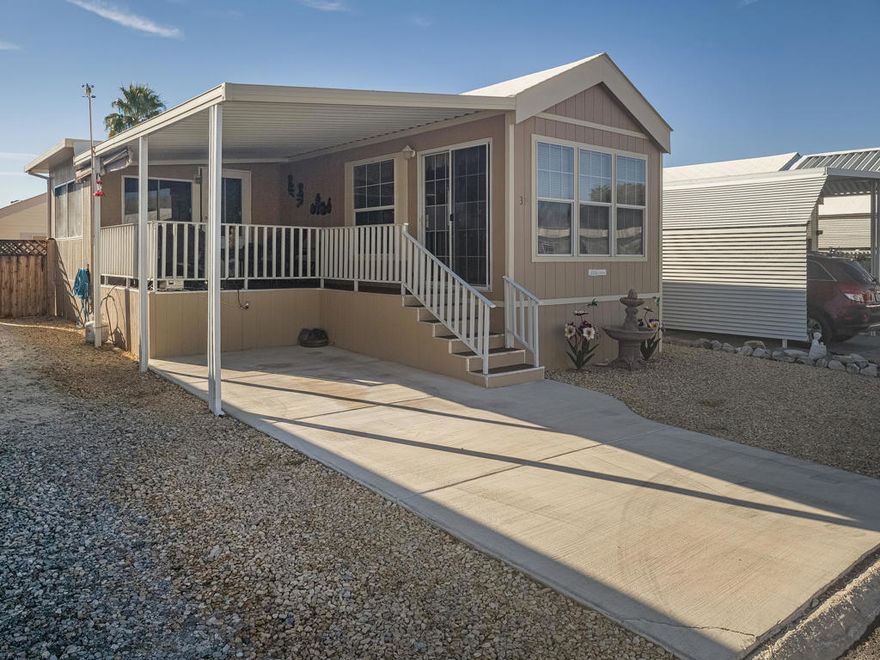 This splendid and super clean 2003 Cavco Park model with ~550 sq. ft. features 2 bedrooms, 1 bathroom and a laundry room in the shed. Bring your creative flair and make this well-appointed home your dream getaway with stunning views from the front covered deck of little San Bernadino Mountains where you can enjoy your morning coffee or unmatched sunsets. The California room is currently being utilized as a 2nd bedroom/office. Ample parking for 2 dedicated spots. Located in the luxurious 55+ Caliente Springs Resort which offers amenities that include mineral hot spring pool and spas, state of the art fitness center, 9-hole golf course, pickleball courts, tennis courts, laundry facilities, library, and fun organized community events. Beyond the comfort and amenities of the home itself, residents of Caliente Springs Resort enjoy a vibrant, welcoming atmosphere where neighbors become friends, and every day brings new opportunities for relaxation and recreation. Whether you're seeking peaceful mornings on the deck, social afternoons on the pickleball courts, or quiet evenings at the library, this community is designed to enrich your lifestyle and provide endless possibilities for leisure and connection in a picturesque desert setting. Come make this your new home or getaway place and enjoy this amazing community. Lot is not owned; space rent is $673.