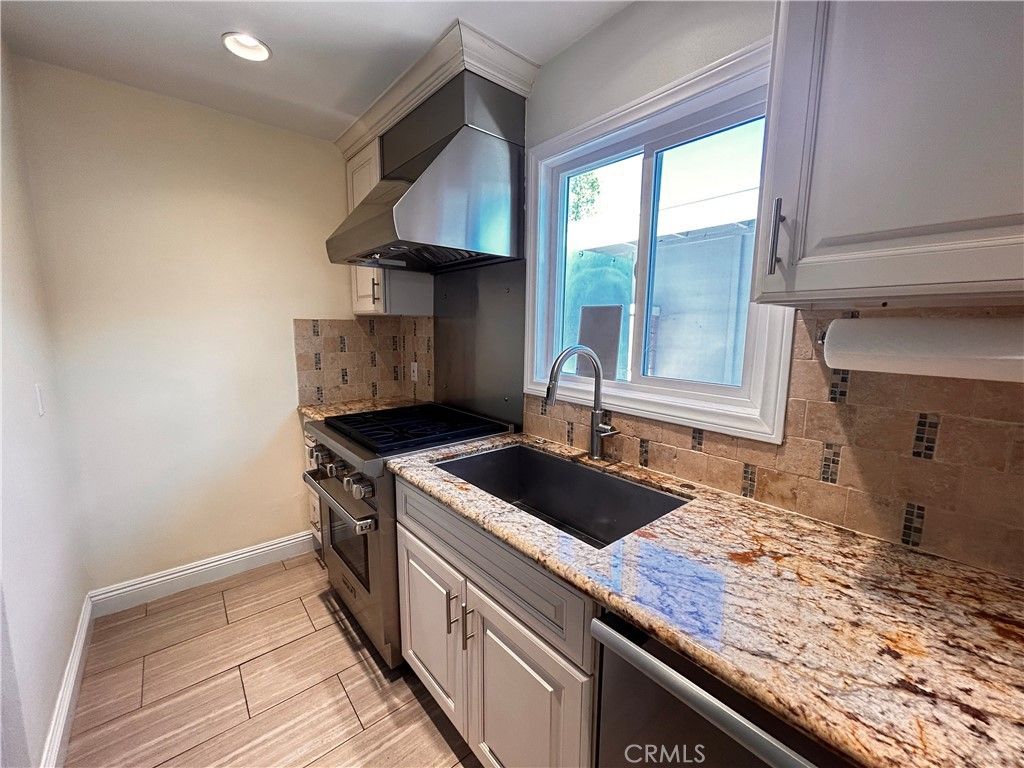 Photo of 19859 Berkshire Ln, Huntington Beach, CA 92646 (MLS # OC26054912)