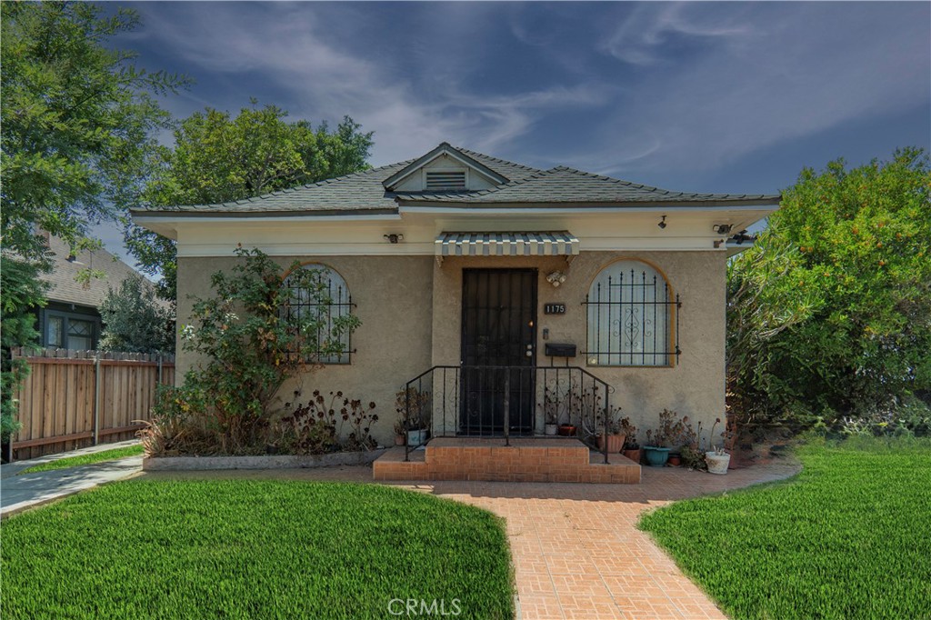 Welcome to 1175 N Commonwealth Ave — A Timeless Gem in the Heart of Hollywood
Step into a piece of Los Angeles history with this charming 3-bedroom, 2-bathroom Craftsman-era home, beautifully situated on a spacious 6,253 sq ft lot. Built in 1908, this residence blends classic character with endless potential, offering a rare opportunity to own a slice of old L.A. in one of the city's most vibrant, evolving neighborhoods.
From the moment you arrive, you're greeted by a warm, inviting exterior that hints at the storybook charm within. Inside, you'll find approximately 1,236 square feet of light-filled living space, where original architectural details whisper of a bygone era—ready to be cherished, restored, or reimagined to fit your modern lifestyle.
Whether you're hosting summer dinners under the stars, planting your dream garden, or considering the addition of an ADU, the expansive backyard offers room to grow—literally and creatively.
Nestled at the crossroads of East Hollywood, Silver Lake, and Echo Park, you’re just minutes from some of the best cafes, markets, music venues, and culture that L.A. has to offer. Grab a cortado at a local coffee shop, stroll to the farmer’s market, or hop on the Metro for an easy commute—this location offers the perfect mix of convenience and cool.
Whether you’re looking for your first home, a restoration project, or a long-term investment in a fast-rising area, 1175 N Commonwealth Ave is more than just a house—it’s a lifestyle.