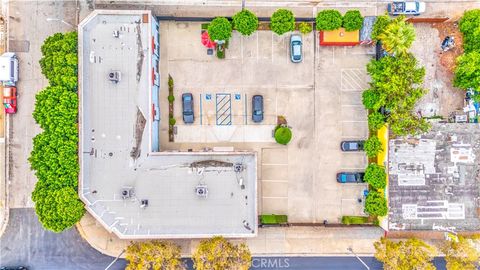 Photo of 702 W Holt Avenue, Pomona, CA 91768 (MLS # PW25260234)