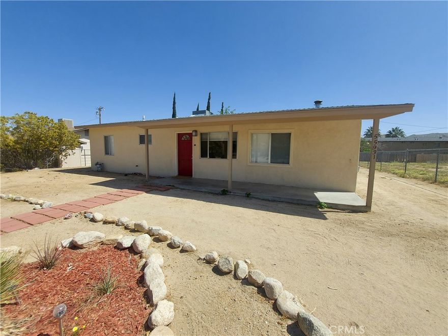 This 2 bedroom 1 bath home is located walking distance to Old Town Yucca Valley. This super cute property has a fully fenced yard and a detached 1.5 car garage. Upon entry you will notice the tile flooring and vaulted ceiling in the living room. The kitchen comes with a double sink, refrigerator, electric cooktop and built-in oven. ceiling fans throughout. The hallway is well equipped with an abundance of storage space on both sides. Both bedrooms have brand new carpet. French doors off the living space will lead you to the large covered patio in the spacious backyard.
