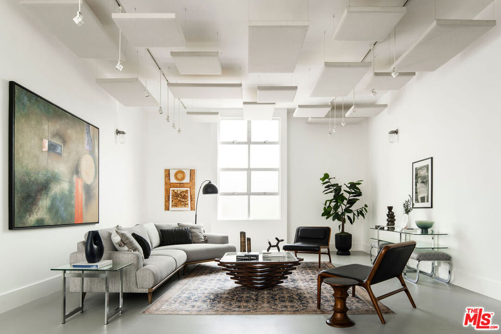 Striking architectural live/work triplex centrally located on vibrant Rose Avenue in Venice. Three distinct live/work residences share a contemporary aesthetic defined by clean lines, soaring ceilings, and abundant natural light, reflecting the creative spirit of Venice itself. This property creates the perfect environment for design or creative oriented businesses: fashion designers, boutique vendors, photographers, interior designers, architects, marketing firms, film or video producers. The possibilities are endless. Live in one unit, work in another, and use the 3rd for out-of-town guests.At the rear, the primary 2,700 sq ft unit stands out as an exceptional owner's home or premium rental (previously leased at $10,000/month). A dramatic entry opens to the expansive gallery-like space perfect for a work studio (architecture, graphic design, photographer), or as an art gallery or boutique clothing store. Up 1/2 level, an open-concept design features a chef's kitchen with premium appliances, a generous and airy dining and living area, and an expansive deck for seamless indoor-outdoor entertaining. The top floor includes multiple bedrooms and lofts that could either be used as living accommodations, or additional work areas. At the front of the property, two additional live/work 1-bed/1-bath units (upper and lower) enhance income potential or provide comfortable living quarters, guest quarters, or additional workspace.Both units echo the modern aesthetic and abundant natural light, while the upper unit includes two loft spaces for added versatility. Completing this unique offering is a 6-car garage with alley access--a rare luxury in Venice. Whether you're seeking a live-work compound, significant rental income, or both, this distinctive triplex combines architectural pedigree with unmatched proximity to Rose Avenue's shops, cafes, and the eclectic Venice lifestyle. The largest unit is vacant (projected rent $10,500), the two one bedroom units are generating combined income of $11,073/month. Both 1-bdrm units are expected to be vacated by the current tenants at the end of November. Estimated Gross Annual Income = $258,876