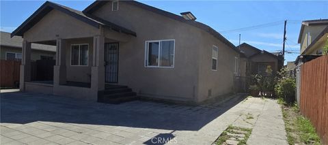 Photo of 700 W 77th St, Los Angeles, CA 90044 (MLS # SB26052437)