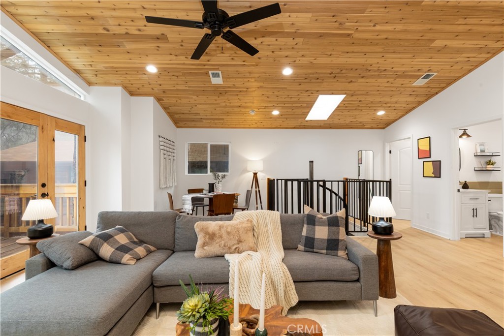 Welcome to this stunning 3-bedroom, 3-bathroom house, meticulously rebuilt to offer a brand-new living experience. This house features gorgeous natural light, it boasts majestic mountain views that provide a serene backdrop to everyday life. The gorgeous electric fire place is perfect for when you want to sit around the fire on those winter night. Designed with the utmost care, this modern mountain house seamlessly blends contemporary comforts with rustic charm, creating a perfect sanctuary to call home. This house also features a central heating and cooling unit which is difficult to find up the mountain.