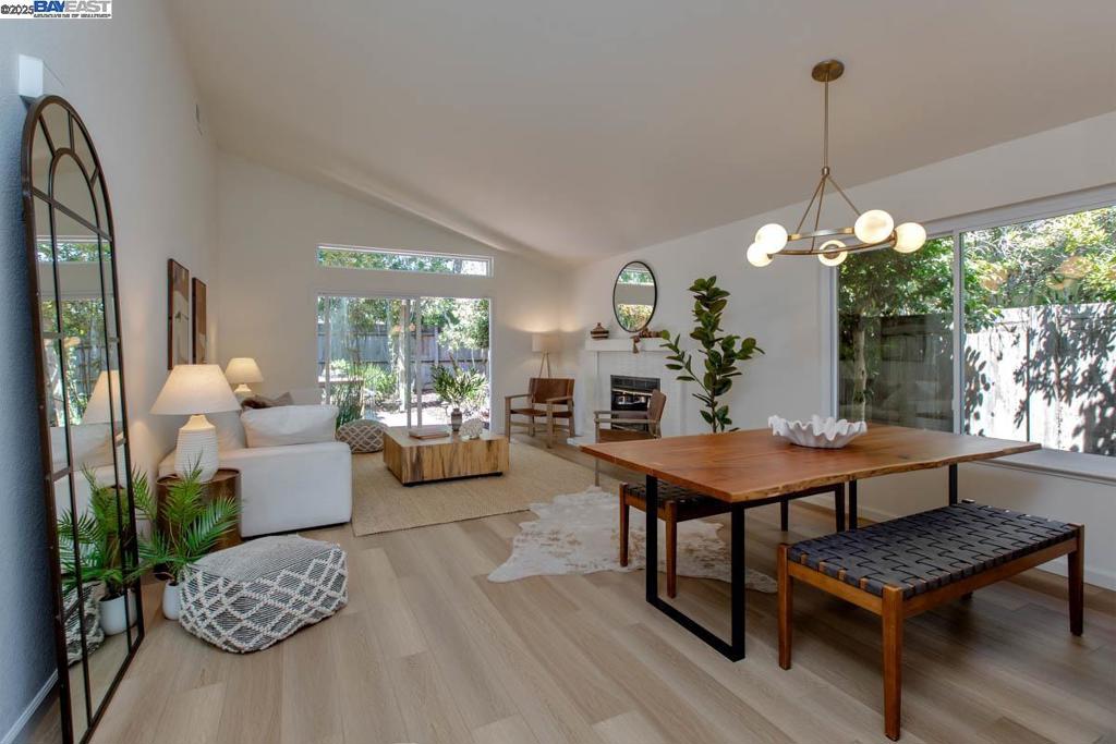 Located on a tranquil cul-de-sac just blocks from Bay Farm Elementary School and Tillman park and playground, this single level, newly updated home was built in 1989 in Pelican Bay HOA, and features three bedrooms, two bathrooms, an open living room/dining room combination, a sunny eat-in kitchen and a 2-car attached garage. Recent improvements include new flooring, stylish light fixtures and interior paint throughout, new quartz kitchen counters, lighting and appliances, remodeled/updated bathrooms, and refreshed landscaping. Details include vaulted ceilings, a fireplace, and dual-pane windows. The private, lushly landscaped backyard has a spacious brick patio and a vine-covered pergola, perfect for entertaining, gardening or simply relaxing. Access to the picturesque SF Bay Trail is right down the street, while the SF Ferry to San Francisco is less than 5 min by bike or car. Unparalleled access to Oakland International Airport for those traveling to destinations both near and far. The first time on the market in nearly 25 years, this home ticks all the boxes for a quintessential Alameda home and lifestyle!