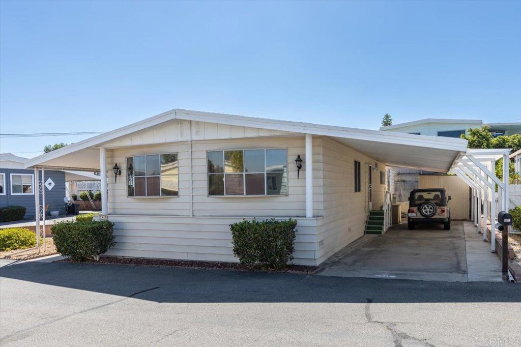 Located in a 55+, gated community with rent control! 2 bedrooms & 2 bathrooms! open floor plan 2 living areas / Dining / Kitchen. Great location in park, corner lot. Rancho Calavero is less than 6 miles to the ocean & is in a rent controlled, 55+, beautiful, gated community. Community amenities include a beautiful lake to walk around & enjoy the ducks & turtles, pool, jacuzzi, clubhouse, dog park, community garden, & social events & activities! Also conveniently located near Tri City medical offices & hospital, Costco, shopping, restaurants, Carlsbad Shoppes (newly renovated indoor mall), easy access to highways 78 & 5, & of course just a short drive to the beach! Space rent is only $745.00 + utilities. Pet Restrictions are: 1 Dog & 1 indoor Cat Or 2 indoor Cats. There are breed restrictions. The Calavera Preserve Hiking Trails are conveniently located nearby, across Lake Blvd!