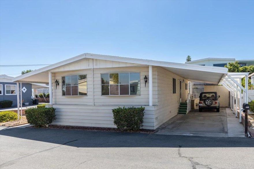 Located in a 55+, gated community with rent control!  2 bedrooms & 2 bathrooms!  open floor plan 2 living areas  / Dining / Kitchen.  Great location in park, corner lot. Rancho Calavero is less than 6 miles to the ocean & is in a rent controlled, 55+, beautiful, gated community.  Community amenities include a beautiful lake to walk around & enjoy the ducks & turtles, pool, jacuzzi, clubhouse, dog park, community garden, & social events & activities!  Also conveniently located near Tri City medical offices & hospital, Costco, shopping, restaurants, Carlsbad Shoppes (newly renovated indoor mall), easy access to highways 78 & 5, & of course just a short drive to the beach!  Space rent is only $745.00 + utilities.  Pet Restrictions are: 1 Dog & 1 indoor Cat Or 2 indoor Cats. There are breed restrictions. The Calavera Preserve Hiking Trails are conveniently located nearby, across Lake Blvd!