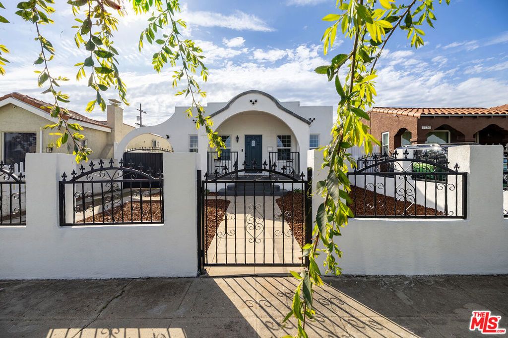 Photo of 1432 W 91ST Street, Los Angeles, CA 90047 (MLS # 26648573)