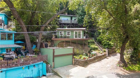 Photo of 432 Fernwood Pacific Dr, Topanga, CA 90290 (MLS # CV26121665)